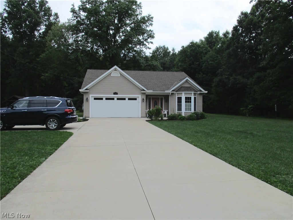 Newly Built 3 bedroom Ranch in 2013...All First floor living....Kitchen includes all appliance, easy close Maple cabinets with Granite counter tops...
Great room has woodburning stove... First floor laundry with built-in cabinets...
Additional lots available, Side lot $49,900 and Back lot $20,000...