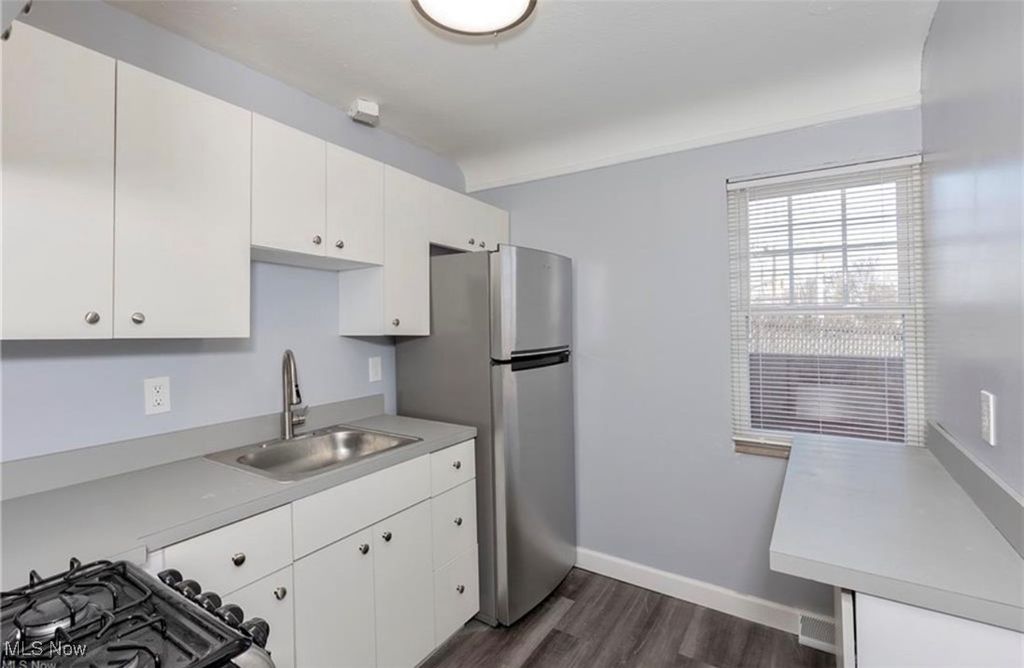 Photo of 1460 S Belvoir Boulevard, South Euclid, OH 44121 (MLS # 5174938)