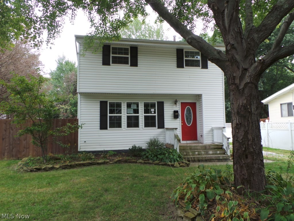 Updated, remodeled Three bedroom colonial with hardwood floors throughout. Spacious bedrooms, full bath on second floor. French doors off kitchen to deck overlooks treed partially fenced backyard. Much larger than it looks! Property sold AS IS.