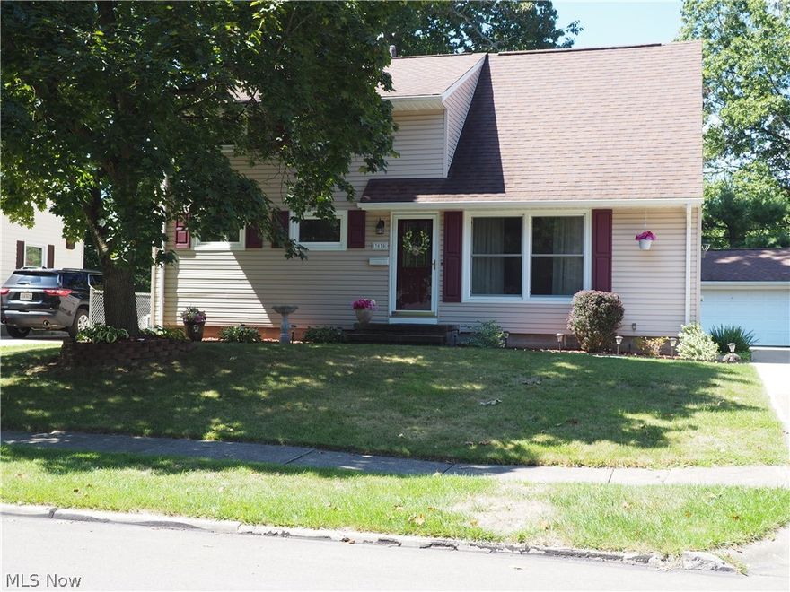 Lot: 60 X 122 Don't miss this beautifully maintained 4 bedroom, 2 1/2 bath cape.  Possible 5th bedroom, the office has an area for a closet. Applianced kitchen with eating area.  Roomy basement recreation room.  Large deck off the kitchen area plus a patio. Plenty of storage and closet space. The master bedroom has 3 closets. Carpet replaced in 2020, glass block windows in the basement, central air and furnace 2012, replacement windows in most rooms. Roof under 15 years old. Siding on the house about 5 years ago, siding on the garage 2022.   Built in shelves in the house stay.