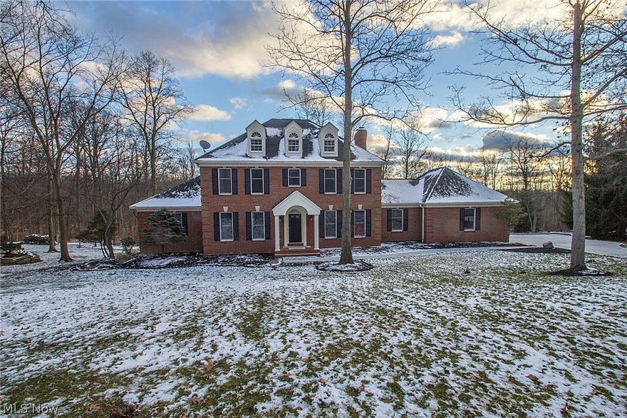 Welcome home... If it's elegance, quality and a charming neighborhood that you seek - look no further!!! Exceptional workmanship and attention to detail is the hallmark of this absolutely gorgeous and completely renovated 5 bedroom colonial. The interior is freshly painted and boasts; neutral decor, 9' ceilings, gleaming hickory floors, beautiful crown molding and spectacular views of the park-like backyard. Gourmet eat-in kitchen w/ granite counters, a breakfast peninsula and high end appliances. Formal dining room. Warm family room with loads of natural sunlight and a brick faced wood burning fireplace (gas option). The spacious living room provides access through french doors to the handsome first floor office/library. The dynamic first floor master provides access to the rear deck overlooking the backyard and boasts an enormous walk in closet and an en-suite bath that will take your breath away... Fabulous first floor laundry/mud room. Wonderfully appointed bedrooms on the second f