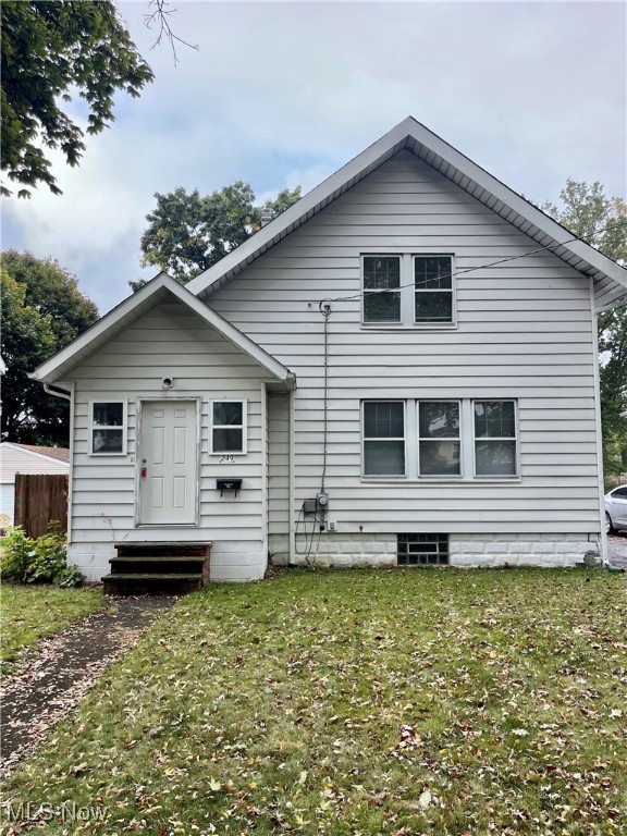 CAN BE SOLD AS PART OF A 10-HOUSE PACKAGE. Off the beaten path, this cozy 1029 square-foot, 3-bedroom colonial offers numerous amenities inside and out. Situated on a quiet street within walking distance of Goodyear Heights Metro Park, the house features central air, a paved driveway leading to a two-car detached garage with glass block windows, and a private, partially fenced backyard. Enter through the front door and you're welcomed by a private, carpeted sunroom that leads to a spacious living area. Both the living room and dining room feature lovely hardwood floors and oak woodwork and drop down ceiling for noise reduction. The sunny kitchen has plenty of newer cabinets, in addition to a newer gas stove and refrigerator and a moveable butcher's block stand for the microwave. Upstairs, the roomy bedrooms provide plenty of closet space, with the largest bedroom featuring a walk-in closet with convenient storage shelves. The updated second floor bath offers a tub with shower. The full basement comes with washer and dryer and has glass-block windows. Currently rented at $1,125 per month plus all utilities. Lease ends 2/28/26. Can be sold as a package with 203 E York, 495 Elbon, 514 Rothrock,700 Kennebec, 804 Manitou, 862 Chinook, 918 Silvercrest, 1072 Pitkin and 1853 Delia. Package listing in under commercial offerings in the MLS. Mls #’s 5136879,5136896,5136982,5136990,5137001,5137005,5137014,5137230,5137233,5137234