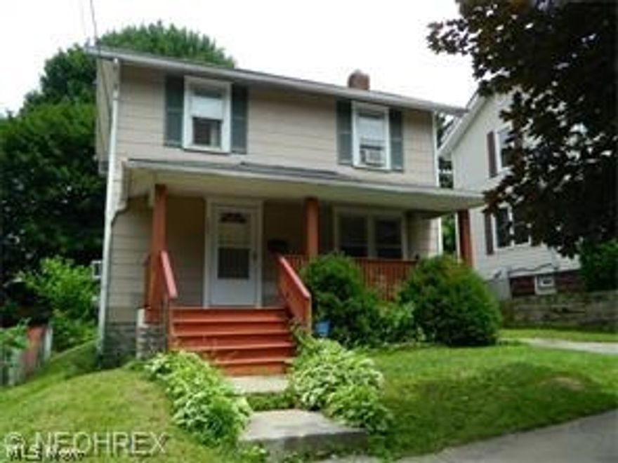 This adorable Goodyear Heights Colonial is a steal at $34,900 would be perfect for a first time home buyer or investor! Tons of updates already completed including: '16 Remodeled kitchen (from the studs up), new carpet and paint throughout (including finished basement), ’13 Hot Water Tank, ’08 Windows, ’07 Electrical Panel. Charming covered front porch and partially fenced in back yard. First floor features large living room, formal dining room and updated kitchen with access to enclosed back porch. Second level has 2 bedrooms and large full bath with classic clawfoot tub. The basement is finished with 2 living spaces-could easily be used for entertaining, office space or an additional bedroom. Glass block windows and shower as well. Quiet dead-end street. Great opportunity to turn a house into a home!! Property being sold AS IS. Subject to short sale approval