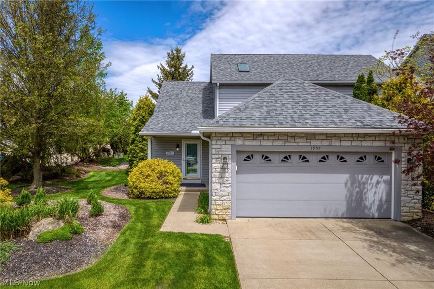 Welcome home to this fantastic cluster home with fabulous natural lighting! You will instantly feel at home with this beautifully landscaped community with 3 ponds. The first floor was built to be entirely handicap accessible. The living room/great room has a cathedral ceiling, large windows, a skylight and hardwood floors. The kitchen features cherry-stained cabinets with a laminate countertop. All of the appliances will be staying including the washer and dryer. The primary and a second bedroom are located on the first floor along with two full baths. The primary bedroom has a Murphy bed that will convey with the property.  It also features a large walk-in closet that has been customized. The primary bathroom has a walk-in shower and a double vanity. Upstairs there is a third bedroom with a wet bar/small kitchen in the large hallway closet, and its own full bath. The loft area would be nice as an office or whatever your heart desires! The basement is completely drywalled, the floor is sealed and the ceiling is painted black. There is a small office in the basement that was used for tel-a-doc appointments. Located next to the Nature Realm and many other metro parks.