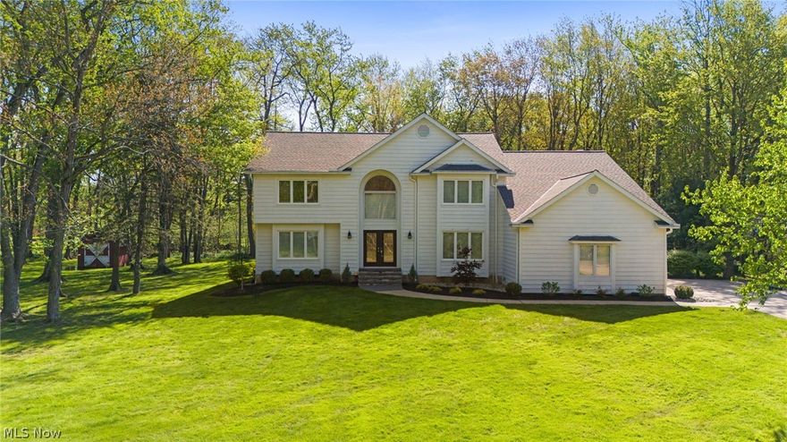 Welcome to 5045 Crofton Ave in the highly desirable Solon community! This exceptional, fully updated 5 bed 4 bath colonial is situated on a rare, large lot that offers both space and serenity and natural privacy. This move-in ready property has been thoughtfully renovated throughout, combining modern finishes with comfortable living. Inside, you’ll find generous living areas filled with natural light, along with an abundance of storage to keep everything organized and out of sight. The huge open kitchen features updated cabinets, granite counter tops with a massive island overlooking the eat in dining area and living room. The massive basement provides incredible flexibility, perfect for additional living space, a home theater, gym, or recreation area. Step outside to your own backyard retreat. The humungous primary suite is exactly what everybody is looking for with huge master bath, large living area and closet space and to top it off a bonus office/den area overlooking the living room.  The huge deck and expansive patio create the ideal setting for entertaining or simply relaxing while enjoying the peaceful, private surroundings. Whether hosting gatherings or unwinding at the end of the day, this outdoor space truly feels like a personal oasis. With its blend of updates, space, storage, and outdoor appeal, this home checks all the boxes and is ready for its next owner to move right in and enjoy.