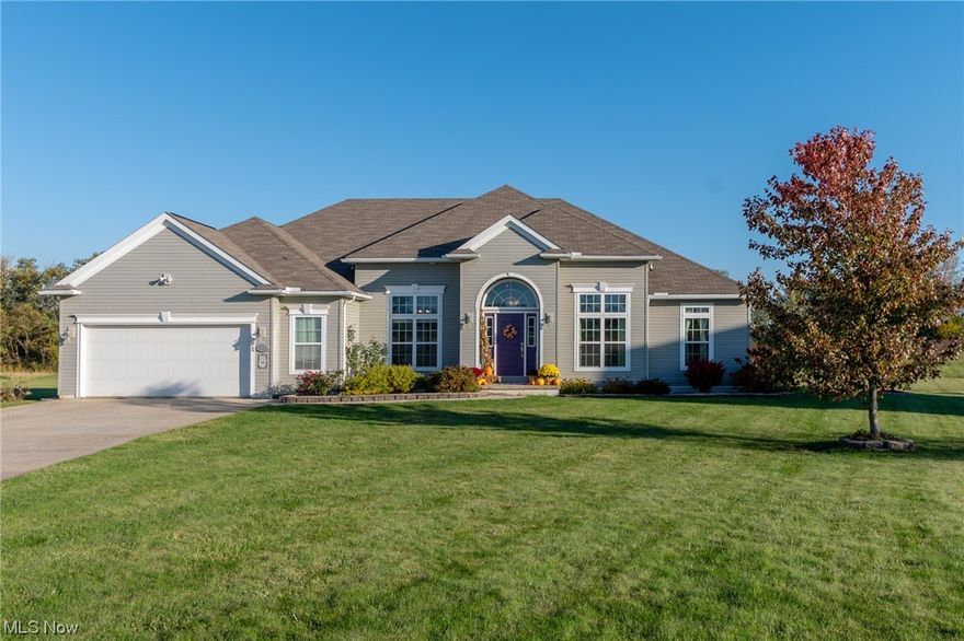 Welcome to this stunning Ranch w/ 4 bedrooms, 3.5 baths, a finished basement, & an excellent location that combines the charm of country living w/ the convenience of city proximity. This open-concept home is brimming w/ storage space & offers a picturesque exterior w/ lush landscaping, a spacious driveway w/ a turn-around, a 2.5 car garage nestled on a generous 1.05-acre lot. As you step through the foyer, you'll notice the luxury vinyl flooring throughout. To the right, a formal office complete w/ a sliding barn door. Moving on, you'll enter the vaulted great room, enhanced w/ built-in features & transom windows that flood the home w/ natural light. The great room seamlessly connects to the kitchen, which boasts upgraded kitchen cabinets, crown molding, pull-out shelves, a walk-in pantry, under-cabinet lighting, Corian countertops, ample cabinetry & stainless steel appliances. The 1st floor is dedicated to all 4 bedrooms, starting w/ the master that features a WIC & an en-suite bath w/ a walk-in shower equipped w/ dual shower heads & a spacious vanity. 3 additional bedrooms share a full bath. Laundry room w/ built-ins & a powder room complete the main level. The basement offers multiple areas for relaxation & various activities & is roughed in for another kitchen area. A full bath completes the lower level. Enjoy warm summer evenings by the fire pit in the backyard, which backs to mature trees. A 1 year home warranty is included for peace of mind.