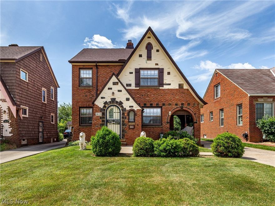 Welcome to 1619 Brookview Blvd! This classic Tudor has an irresistible curb appeal with brilliant features that will pique your curiosity. You are greeted by two custom stone lions sitting in front of the sharply contrasting brick/stonework, matched with the steeply pitched gable roof (full tear-off '21), along with embellished doorways, and arched covered front patio. The garage offers a versatile space as a workshop/car port (new garage doors '21) and an attached covered patio w/ enclosed storage. For the last SIX decades, the current homeowner has cared for and maintained the grounds and structure which will be evident while you are on your visit. Making your way through the vestibule the first level provides signature archways leading you into each room. Take notice of the original light fixtures throughout the main level. Hardwood flooring sprawls throughout the home (also under the carpeting in the living room). Offering 3 bedrooms, 2 full baths, and a partially finished lower le
