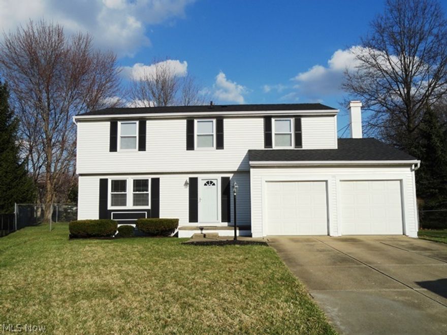 Beautifully remodeled home with almost $40,000 in improvements.  Just move in! This home is loaded with high-end updates! Gorgeous wood floors throughout LR, DR, foyer, kitchen, upper hall & bdrm 4. Newer dimensional shingle roof, furnace, AC, stainless steel gas range & microwave, dishwasher, carpeting, light fixtures, ceiling fans, faucets & hardware & window treatments throughout.  The master suite is spacious and has room enough for a sitting area, there is a walk-in closet and vanity-dressing area.  Bathrooms have been beautifully updated/improved as well. White Levelor faux wood blinds.  Located on a quiet cul-de-sac street, located on the cul-de-sac minimizing traffic. The family room has an angled fireplace and leads to a lovely brick patio that overlooks a good size level, fenced backyard. Sump pump has battery back-up. There is a shed for additional storage.  This home is impeccably maintained. Exclude fridge, tv+ mount in fam rm, W&D, freezer, all wall décor.