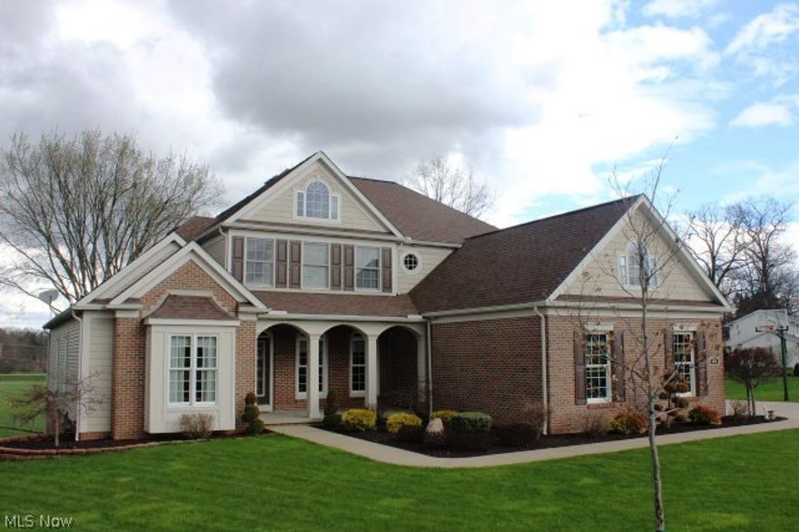 Phenomenal design, style & quality* Located in Danbury Glen this 1.5 story built 2005 offers 4 bedrms, 3.5 baths, 3063SF, 3 car side load garage & situated on .63 acre cul de sac lot* Some of the features include volume & 9' ceilings, flutted & extra wide woodwork, crown molding, oversized windows, alcoves, curved archways, 6 panel doors & central vac* 2 story foyer* Vaulted great room with floor to ceiling windows, FRPL & special niche for TV* Formal dining room w/crown & wainscoting* Sun room off of kitchen wrapped with windows & access to deck*  Spacious kitchen with breakfast bar, stainless appliances & walk in pantry with frosted glass door* 1st floor master w/ walk in closet & master bath w/corner garden tub, double vanity & shower* 1st floor office & laundry* Bedroom 2 with private bath & walk in closet* Bedroom 3 & 4 with Jack & Jill bath* Loft area* 13 course walk out basement to covered patio, plumbed for bath & ready to be finished* Generous 3 car heated garage* Covered fron