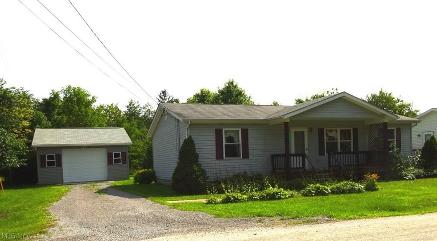 Easy to Own - 3 bedroom, 1 full bath Ranch built in 1997.  Large Living Room is open to kitchen and dining area.  Bathroom has double sinks and new tub and surround.  Open staircase to partially finished basement area.  Deck overlooks back yard.  Covered front porch.  Detached garage (2012).