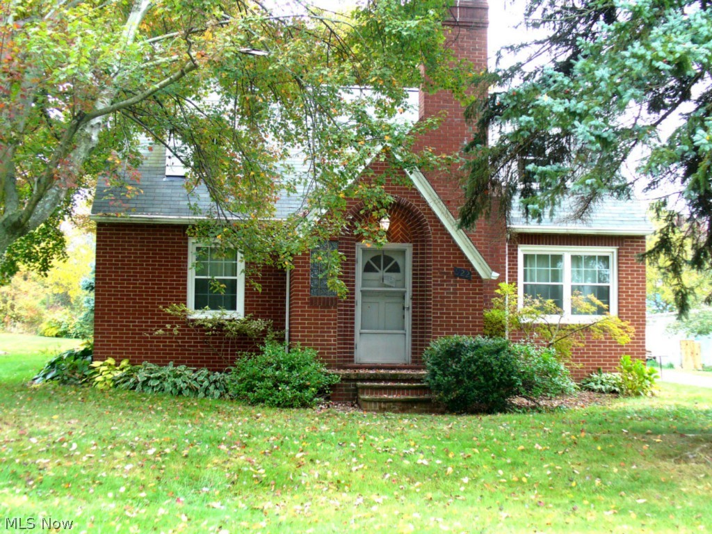 Cozy Brick Bungalow - Easy Keeper! Inviting entrance leads to comfortable living room with wood burning fireplace, dine in kitchen and 2 bedrooms with hardwood floors( 2nd bedroom is currently being used as laundry room but could easily be converted back to bedroom space) complete the main level. Spacious 3rd bedroom with hard wood floors and cedar lined closets on the second level. Basement could be finished for additional living space which includes wood burning fireplace, laundry hook up, F/A gas furnace & breaker electric. Two car detached garage connect by a relaxing brick courtyard. Updates include New windows & roof in 2010.