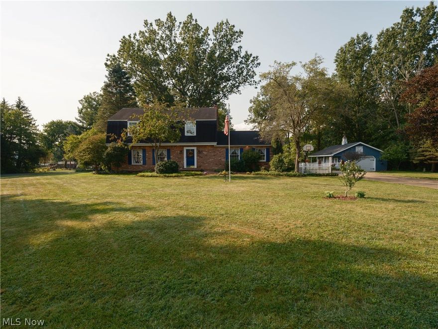 Original owners of this 4 bedroom, 2 1/2 bath colonial with living room, dining room, eat-in kitchen, family room opens to kitchen with wood burning fireplace converted to gas. New Pella patio door (2021) leads out to large deck - perfect for entertaining. Master bedroom (freshly painted) with master bath with stand alone shower. Main bath features a whirlpool tub. Partially finished rec room in basement. Deck is built on a full foundation (brick and block) with a footer - could be converted to a year round sun room. Gas line on deck. Detached garage (1984) with electric and gas furnace. 2 Car attached with hold and cold water, drain and door opener. Bedrooms 2 and 3 have window seats with storage. Pride of ownership shines in this home.