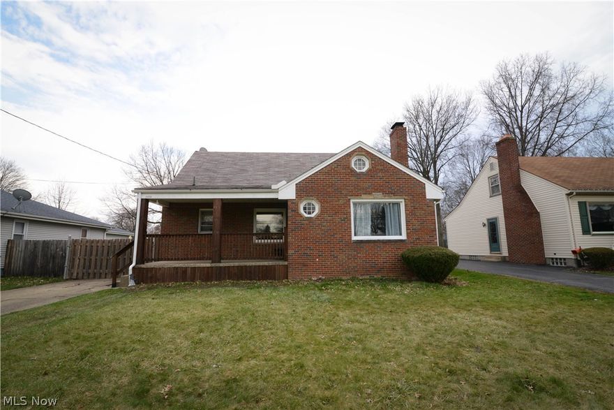 Absolutely Adorable and Abundantly Spacious!!! This All Brick, three bedroom gingerbread house conveniently located in the heart of downtown Boardman has A LOT to offer! When you arrive, you will find beautiful hardwood flooring greeting you. You will see this flooring throughout the home, especially featured in the formal living room with wood burning fireplace. Moving along to the super-sized, eat-in kitchen (20x13) equipped with 16 inch tiles and ample counter space, you will notice how great it could be for entertaining. The upstairs bedroom is Gigantic (34x15) and has Enormous potential, with its large walk-in closet and freshly updated half bath. Back on the first floor are the master bedroom (13x12), bedroom number three (11.5x11) and the tastefully renovated main bath. The partially finished basement (33x14) is currently being used as a studio, but could easily be an additional living suite or family room that adjoins its full summer kitchen! In the unfinished portion of the ba