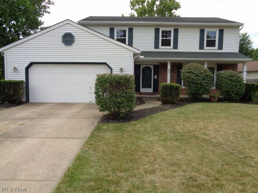 Desirable Huntington Park Estates Development! Easy to show! Immediate possession! Turn the key and move in! Freshly painted throughout with neutral colors. Eat in kitchen with oak cabinets, lazy Susan, pantry and brand new range. Living room has crown molding. Formal dining room features chair rail and crown molding. Family room includes brick fireplace and slider leading to a covered patio. Owner suite features full bath and three closets. First floor laundry room. Finished basement boasts recreation room, mechanical room with storage shelves. Stained woodwork throughout. Half bath has ceramic floor and new sink. 2 1/2 car attached garage with work bench and hot and cold water. Roof 2012. Development offers a pool and tennis courts. 1 year HMS Home Warranty.