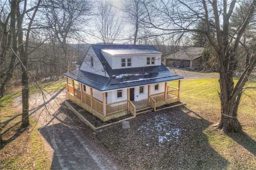 This beautifully remodeled craftsman home sits on a 7 acre oasis just around the corner from downtown Chagrin Falls. At 3,000sqft, your new home features luxury upgrades, leaving plenty of room to make it your own. Up only a few steps onto the gorgeous new cedar wrap around porch and in the front door, you’ll find everything for comfortable first floor living. First floor Master Bedroom features a walk in closet and an amazing fully rebuilt Master Bath with a Brand New Custom Steam Shower, equipped with LEDs and sound system. The kitchen has been fully remastered, from the Amish made Shaker style soft-close cabinets, granite counters, large island, and pantry to the Amish made ceiling beams extending above the dining room with refinished hard wood flooring, that leads to both a half bath and first floor laundry room added for your convenience. The second floor has three bedrooms and another remodeled bath with a custom designed walk-in shower and standing tub. The Walkout basement is r