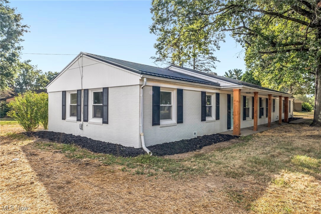 Come check out this beautifully updated ranch home in North Canton with one floor living! You'll fall in love with all of the updates in this charming home. The kitchen has been updated with new cabinets, new granite counters, new subway tile backsplash, new stainless steel appliances, new flooring, lighting and fixtures. The main bath has been updated with a new tub and beautiful tile surround, new vanity, new lighting, new light fixtures and hardware and new flooring. The entire house features new paint, new flooring, new lighting and new hardware! There's even an enclosed 3 season room off the dining area with plenty of room for furniture. With 1,600 square feet, 3 large bedrooms and a huge living room there's pleny of room for everyone in the family. There's even a brand new metal roof and the property was recently connected to public sewer. Nothing to do here, just move right in! Agent Owned.