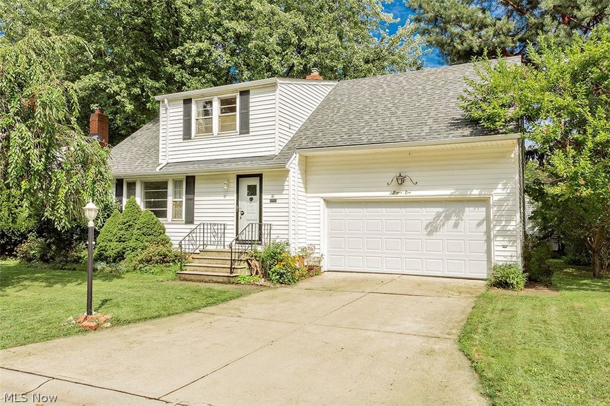 3 bedroom Cape Cod on unique street in great North of Blvd. location! Large, bright living room with picture window. Ample eating space in kitchen, granite countertops, updated cabinets. Dining room leads to trexx deck with vinyl fencing. Family room with beamed cathedral ceiling and fireplace. Beautiful hardwood floors in living, dining rooms and bedrooms. 2 car attached garage. Walk to Sims lakefront park. City compliant. Euclid Waterfront Improvement Plan at end of street is nearing completion. It will have walking paths. Private access from street to walking path.