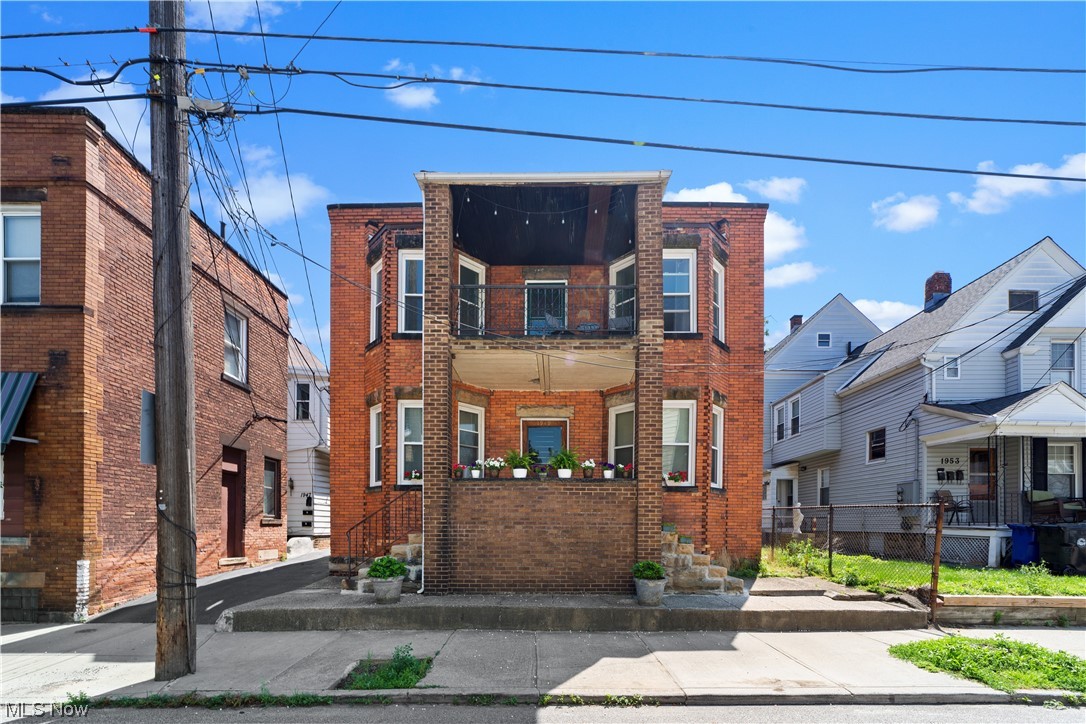 Extremely rare opportunity to own TWO neighboring, income producing fourplexes in the heart of Little Italy! This 8 unit portfolio is ideal for an investor to gain instant scale with 8 apartments in one of the most desirable and growing neighborhoods of Cleveland. The properties are currently grossing $7,285 at 100% occupancy as of 9/1. A savvy investor can easily increase rents as leases come due, or complete strategic cosmetic renovations on the interiors of the units to fetch top dollar rents in the area and have this portfolio grossing $9,000 per month in the future. The two buildings share a driveway as well as parking in the back, allowing for management efficiencies due to proximity. Both properties are beautifully built, brick construction & contain various floor plans including a studio apartment, one bedroom units and two bedroom units (see rent roll for full breakdown). There are two covered garage spots as well as room for additional cars in the lot. Garage also has additional covered storage space. Parking income can easily be increased as off street parking in the area is in high demand. Both properties have had all windows replaced with vinyl, solid mechanicals and roofs with significant life left in them as well as other capital improvements including appliance replacements and unit updates. 1949 contains coin-op laundry for use by tenants (laundry cost also has never been increased & can be).