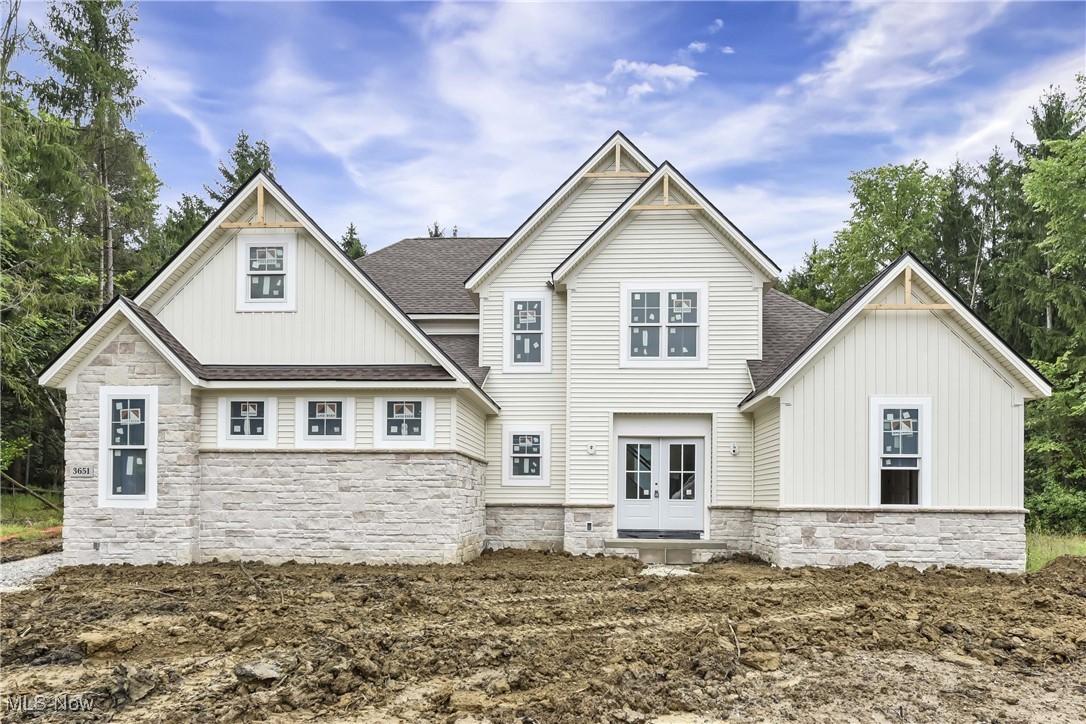 Prepare to be Moved! Welcome to your dream home in the prestigious Regal Brook Farm neighborhood of Medina Township. This stunning 3 bedroom, 2.5 bathroom Colonial home is nestled on 2 acres of park-like land, surrounded by mature evergreens for added privacy. W/ construction to be completed in just 30-60 days, this home is the perfect opportunity to make your dream a reality. As you step through the welcoming double doors, you are greeted by a grand foyer w/ crown molding. The 1st floor features laminate flooring throughout, including the owner's suite, which boasts a walk-in closet & luxurious ensuite bathroom w/ quartz countertops. The open-concept kitchen is a chef's dream w/ a center island, quartz countertops, pantry & top-of-the-line appliances, including a 48" dual fuel double oven. The heart of the home is the great room, w/ its double beams in the 2-story ceiling & floor-to-ceiling stone fireplace. Large windows flood the room w/ natural light. Upstairs, you'll find 2 spacious bedrooms & a loft, providing plenty of room for your family to spread out. But the luxury doesn't end there. This home also features a full unfinished basement, a 2-car attached garage, & high-end amenities such as a wi-fi thermostat, Anderson Fibrex insulated windows, & a tankless on-demand gas water heater. And w/ a Carrier high-efficiency gas furnace & A/C, you can stay cozy all year long. Imagine enjoying your morning coffee on a back deck, overlooking the beautiful backyard & peaceful surroundings. In the evenings, gather w/ family & friends for a cookout on a grill w/a gas line connection. Located in Medina Twp., this home offers the perfect balance of privacy & convenience. Close to Route 3 & 42, you'll have easy access to I-71 & all the shopping & amenities you could need. Don't miss this opportunity to own a piece of luxury. Concrete driveway and front entry sidewalk will be included. See photos for finishes & supplements for upgrades, floor plan and more. *Warranty offered*