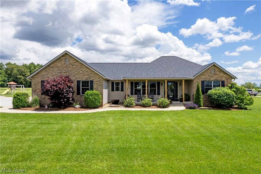 2008 built ranch home situated on 2.25 acres with a 64x40 outbuilding in Triway S.D. Open floor plan boasting beautiful decor. Master bedroom has large walk in closet and master bath with large, jetted tub, separate shower and dual sinks.  You will love the spacious kitchen with center island overlooking the living room and dining area. The split floor plan offers 2 additional bedrooms that share a hall bath with separate double vanities. Nice first floor laundry room near garage entrance.  One-story living with additional living space in the lower level that includes a family room and a room ready to finish as a bathroom with plumbing already in place. House has wood heat or electric. This home also features radiant hot water heat in the flooring throughout the finished lower level.  The out-building has electric, lighting and is plumbed for heated floors (just needs hooked up). Don't Miss this tip top shape ranch home. Roof shingles were recently replaced, facelift to the front porch and shutters as well.  The back yard features a wonderful cement patio.  This home has amazing views all around.