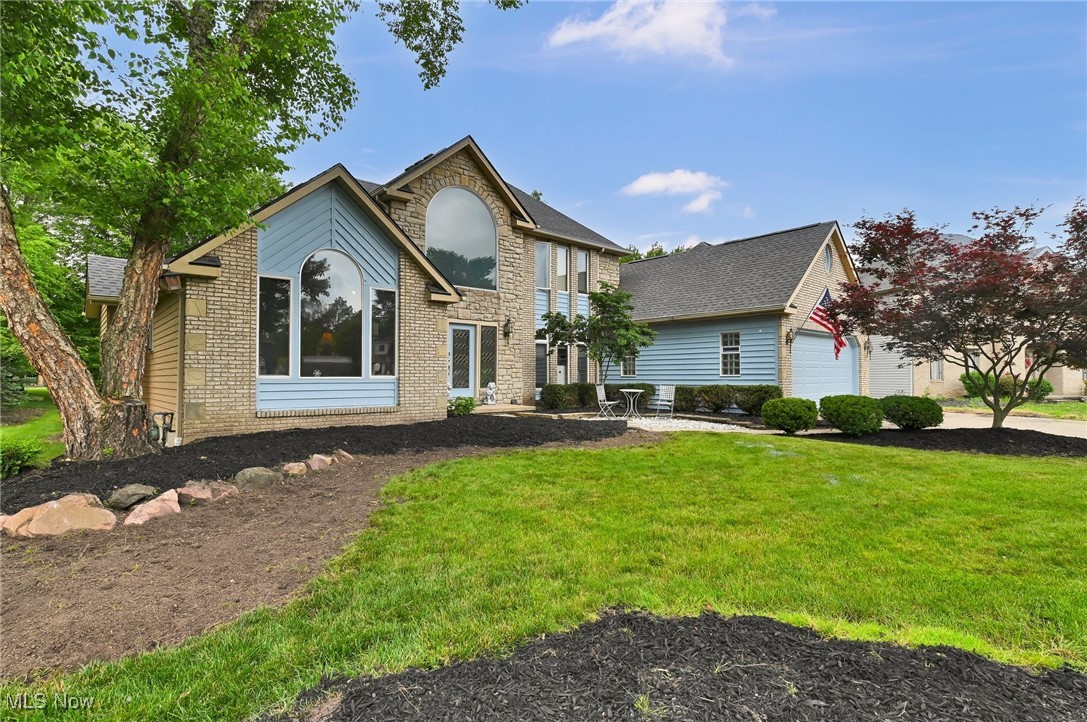 Nestled in the heart of Strongsville, this stunning four-bedroom colonial home sits gracefully on a generous half-acre cul-de-sac lot, offering both privacy and tranquility. As you step inside, you're greeted by an inviting open concept layout, enhanced by newer flooring that flows seamlessly throughout the main level. The great room is a standout feature, boasting a charming brick fireplace surrounded by custom decorative ceilings, bathed in natural light that creates a warm and welcoming atmosphere.The heart of the home is undoubtedly the spacious kitchen, where vaulted ceilings and a skylight elevate the space, allowing for an abundance of natural light. With ample counter space topped with exquisite granite, a beautiful center island, stainless steel appliances, and custom storage options, this kitchen is perfect for culinary enthusiasts and family gatherings alike. A sliding door leads you to a picturesque deck that overlooks beautifully landscaped grounds, ideal for outdoor relaxation and entertaining. The main floor also features a versatile den with elegant French doors, which can serve as a home office or media room, complemented by custom wall decor that adds a touch of sophistication. The first floor master suite is a true retreat!!! offering a generous layout with dual sinks and a luxurious Jacuzzi tub, perfect for unwinding after a long day. Downstairs, the partially finished basement provides additional recreational space, catering to all your needs. Upstairs, you'll find spacious bedrooms, each equipped with ample closet space and newer flooring, ensuring comfort and convenience for the entire family. Roof 2023, newer windows 2022, newer flooring 2025, whole house newer painting 2022, (6) newer skylights 2023, new fridge 2025. For added peace of mind, a one-year home warranty is included, making this beautiful colonial a perfect place to call home.