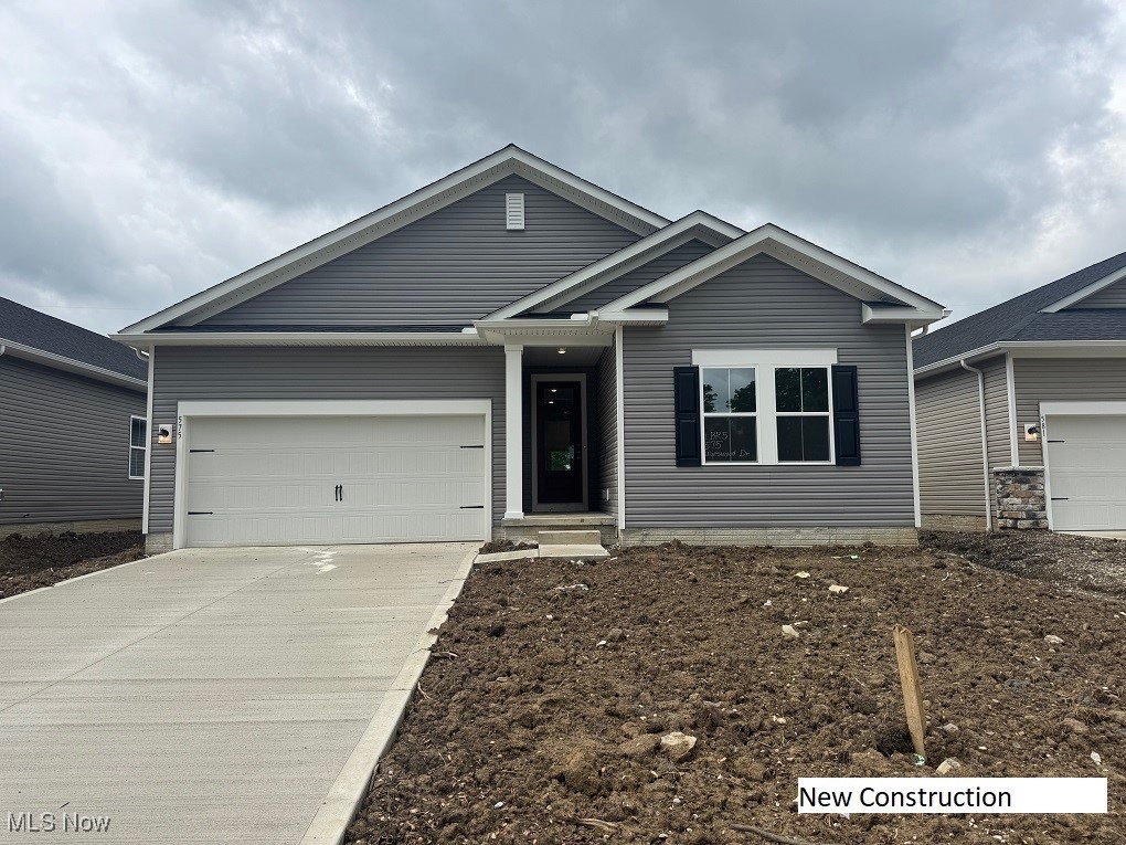 This beautiful ranch-style home in the established Longbrooke community of Berea, featuring a full unfinished basement—not a slab! This home has been designed with brushed nickel hardware, grey kitchen cabinets, white bathroom cabinetry, and luxury vinyl plank flooring throughout the main living areas. The open layout includes a spacious great room, gourmet kitchen with large island, and a private primary suite with walk-in closet. Enjoy the flexibility of an extra room perfect for a home office or guest space. Step outside to relax or entertain on the covered back deck, perfect for enjoying warm summer evenings ahead. This home will be completed at the beginning of July and awaits its new homeowners! Special builder financing and incentives available—schedule your private showing today!