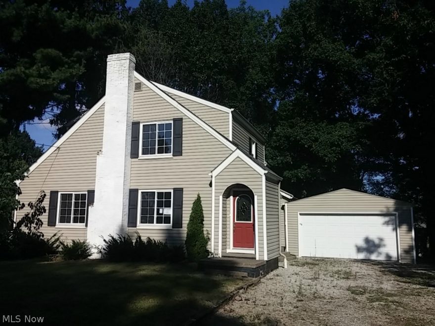 Super cute 3 bedroom 1 bath home with curb appeal galore  Lots of updates already done for you.  Huge living room with cozy fireplace and lots of windows that flood the room with natural light.  Very bright and cheery feel.  Master bedroom is very large and will accommodate a king size bed and large bedroom furniture with ease.  Nice soaking tub in the bathroom for those cold winter months that are right around the corner.  Newer windows, two car garage, convenient location and close to Perry High School are all added bonuses.   Stop and see for yourself!!