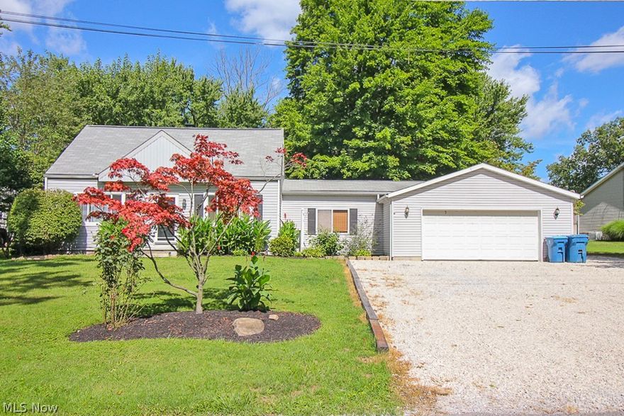 Welcome to this cozy home that is well taken care of! Home features 2 bedroom with a bonus loft upstairs, a partially finished basement, a fire place in the living room, gas burning stove in the basement, an over sized two care garage, and a large beautiful backyard. This home would be a perfect starter home!