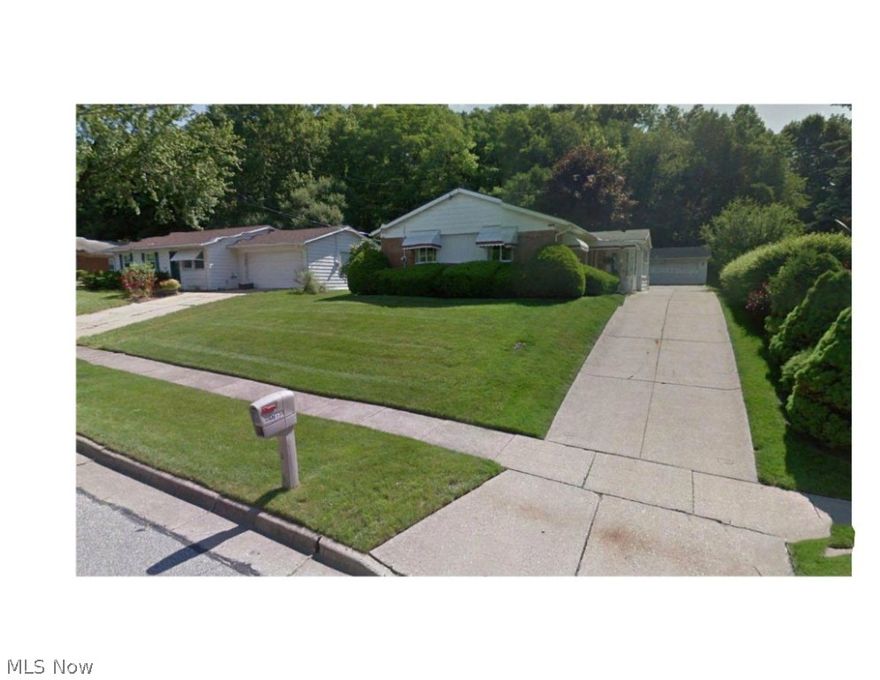 Large rooms and convenient layout make this tidy Ranch home special.  Many updates including roof (2010), furnace (2010), and updated porch (2010) add even more value.  Living room adjoins the formal dining room which is separated from the efficient galley-style kitchen. 2 good sized bedrooms share the bath. Oversized 2 car detached garage.  A nicely landscaped rear yard rounds out the backyard.  The home is located in the Akron City School District and is convenient to shopping, parks and the expressway.  A great way to start home ownership!