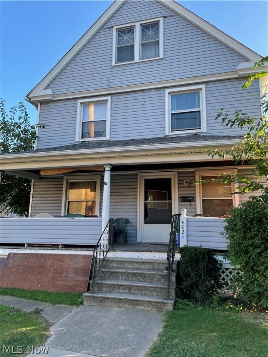 Over 1600 sq ft in this Cleveland colonial with beautiful original woodwork and sliding doors. Large formal dining room. Eat in kitchen with butlers pantry. Home has 3 bedrooms and 1 bath. Vinyl siding, updated furnace and water tank. Huge lot that extends behind the neighbors garage.