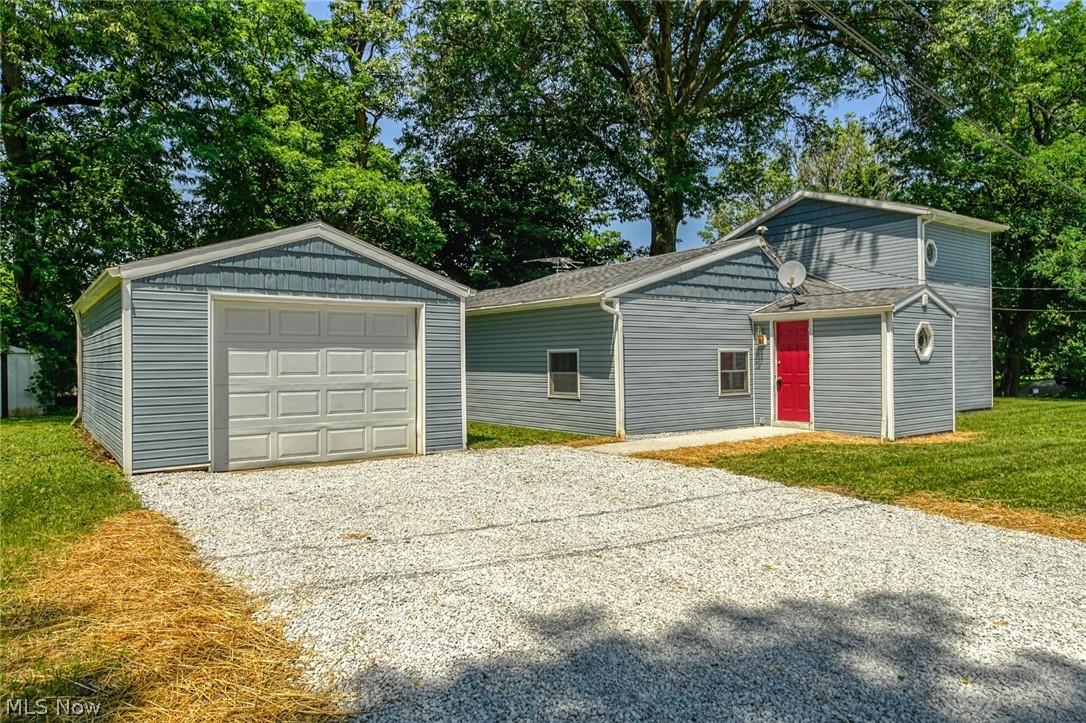 One of a kind deal in Springfield Township! This home has been transformed into an incredibly spacious three bedroom home, situated on a great, large lot. The main door brings you into the convenient mudroom/foyer. From there to the large family room, which provides access to the enclosed porch and jacuzzi. Passing down the hall, you will find the bathroom and utility/laundry room. The all new bathroom is gorgeous, with ceramic tile floors, new vanity and lighting, new toilet, tub and classic tile surround. Then to the living room, with a unique nook for books and decor. The kitchen is new from top to bottom. New wood look tile flooring, modern white cabinets, granite look laminate counter tops, stainless double sink, refrigerator and gas range. There is also an additional exit to the back/side yard. One step up to the formal dining room. The master bedroom is also located on the main level. Then up to the second level for the remaining two bedrooms. The siding and roof ar