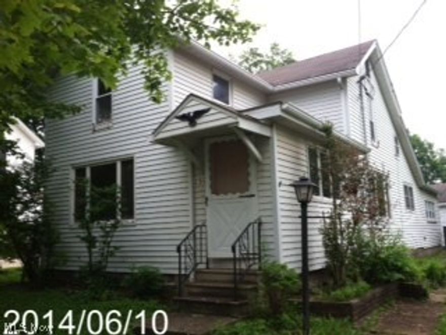 Spacious four bedroom, one bath two-story home on approximately one acre. Highlights include large rooms, basement and two-car garage. Bank owned, NOT a short sale. Sold as-is with quick closing.