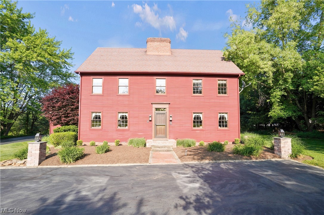 Welcome to this meticulously maintained 3 bedroom garrison style colonial - ready and waiting for it’s new owner!! Nestled on 2 acres of a former apple orchard the secluded yard is the epitome of country living. Enter in through your attached garage to the family room with stunning backyard views through bay windows and an incredible brick floor. An impressive fireplace commands attention and gives unmistakable character to the open style family room and kitchen area. Completing the first floor is your laundry and half bath with a formal dining room and separate living room, both boasting fireplaces for a total of 3 on the main level! Upstairs you will find an owners suite with a private bath, 2 bedrooms with a bathroom steps across the hall and ample closet and storage space throughout. The third floor offers its own full bathroom and can be used as another bedroom, office, rec room, and more! Walk out back to grab an apple off of one of your trees and enjoy your expansive patio and m