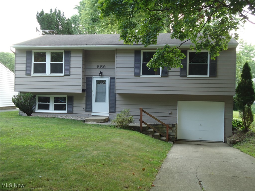 Don't miss this well-kept 3/4 BR / 2 BTH home in a great Kent location!! Freshly painted inside and out---The oak kitchen features all brand new appliances with loads of cabinets/pantry & newly installed granite countertops---Updates include vinyl replacement windows & 6 panel interior doors as well as new LVP flooring, making for a bright, cheery feel throughout the home. The lower level features a family room/4th bedroom with full bath & a rec room/office area. Outside is a large, covered deck perfect for outdoor activities overlooking the flat, fenced yard---perfect for kids and pets! Call today for your private viewing---you'll be glad you did!