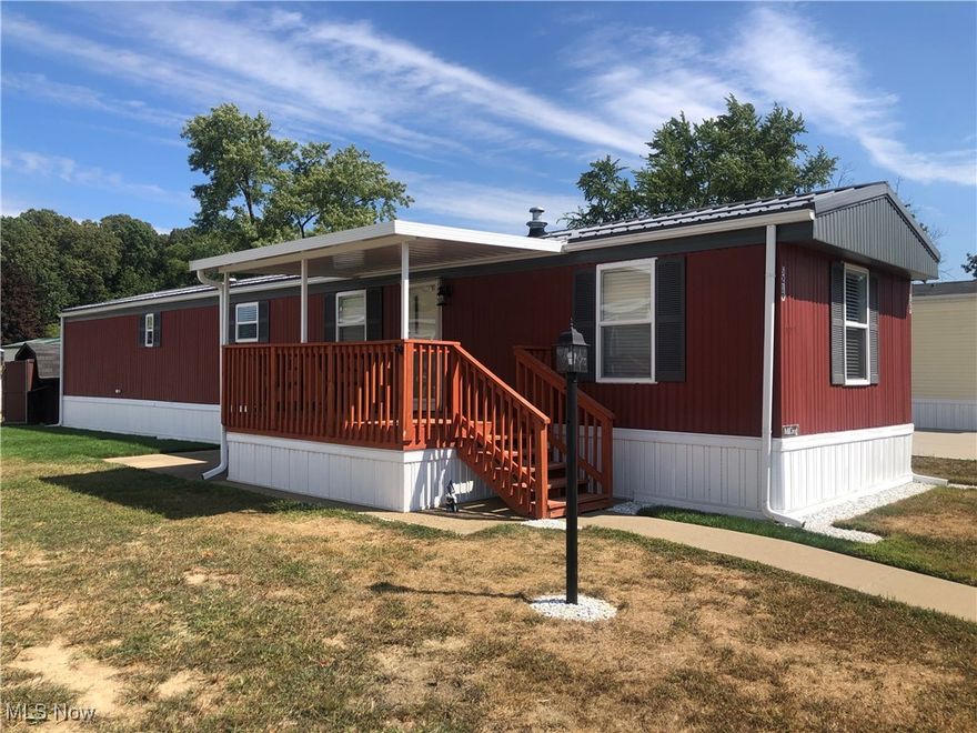 Totally remodeled 2 bedroom mobile home in Sandy Valley Estates. Everything has been done inside and out within the last 3 years. Enjoy the open floor plan featuring a kitchen with stainless appliances and LVT flooring, a spacious living room with LVT flooring, a large primary bedroom with carpet and a big closet, an ample sized 2nd bedroom with carpet and big closet, an updated full bathroom and a laundry area. Other features include a relaxing covered porch, a storage shed, new vinyl windows, new kitchen cabinets and appliances, new bathroom, new light and plumbing fixtures, new flooring throughout, fresh paint inside and out, new metal roof and more. Lot rent is $558 per month. Sandy Valley Estates offers a playground, basketball courts, community center and it's conveniently located close to the Sandy Valley Schools Campus.