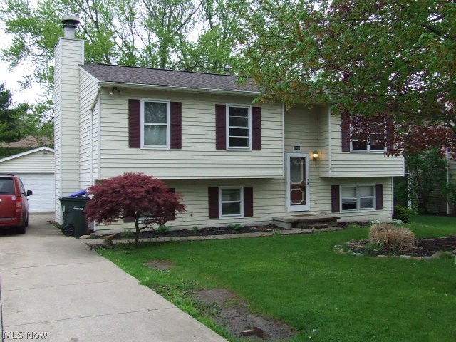 Move-in ready Bi-Level home offers many extras! On the main level a formal living room nestles at the top of the stairs. The eat-in, applianced kitchen is open to the living area and features French doors onto a large deck, perfect for a BBQ or just to sit and watch the stream. A large master bedroom has two full closets and plenty of space. The 3rd bedroom is large enough for two! You will find a finished lower level with a large cozy family room highlighted by a beautiful fireplace. Also on this level is a bedroom, half bath, utility/laundry room and bonus area finished with built-ins that could be used as an office, workshop or craft room. In addition, there is a fenced back yard that overlooks a lovely stream flowing along the back property line. Two car detached garage with opener and electric. There is a baseball field at the end of the street, and also close to shopping, schools, parks and expressway. Make this Cuyahoga Falls home yours! Call for a private showing toda