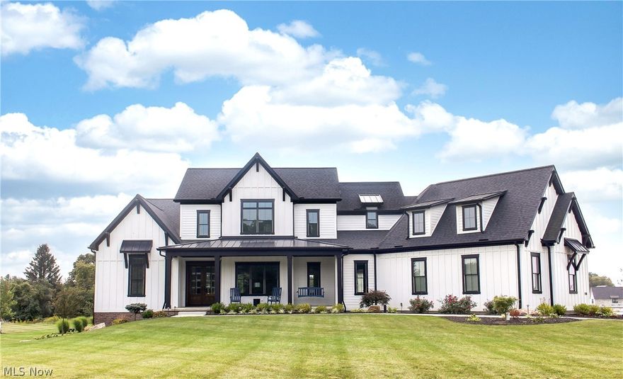 Custom-built Arthur Rutenberg home on 2.4+ acres in Sharon Township (Highland Schools). This home has an open floor plan concept with high ceilings and tons of natural sunlight throughout. The gourmet kitchen is the center of the home and features large center island, 6 burner gas range, wine/beverage center, and custom walk-in pantry. The kitchen is open to the family room w/gas fireplace. The family room has oversized sliders that lead to a covered patio, complete w/wood burning fireplace and outdoor kitchen. First floor master suite, guest suite, den, laundry room, and mud room complete the first floor. Second floor features 2 en suite bedrooms and a loft. The lower level is made for entertaining and features full bar, game room & media room. A full bath, potential 5th bedroom, and workout room complete the lower level. Custom features and the highest quality and craftsmanship throughout. Ideal location with easy commutes to both Downtown Cleveland or Akron. Minutes to all the conve