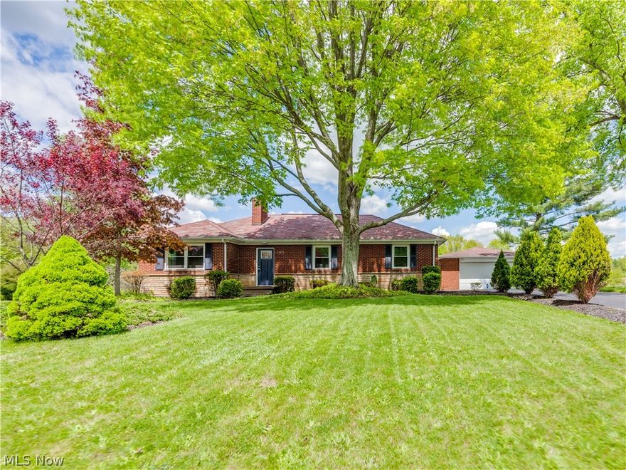 Welcome to this 3 bedroom 2 full bath all brick home located on a lake with Green LSD.  Walk into the foyer and into the living room with fireplace and open concept living into the dining room.  The kitchen has white cabinets, stainless appliances, granite counters and access to the backyard.  There are three bedrooms all with large closets and a full bath on the main level. Walk out lower level has a recreation room and fireplace. There is an additional area with a full wet bar, perfect for entertaining.  A separate room for storage plus a laundry area.  A full bath completes the lower level.  This home is completely updated and beautifully maintained. Call today for your own private showing, this home will not last!