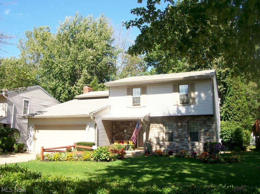 Beautiful Colonial on perfectly landscaped lot.  This home has 4 bedrooms, 2 full baths plus 2 half baths and has been meticulously maintained.  Master bedroom with private bath.  Living room and formal dining room.  Lovely kitchen with newer cabinets.  A cozy family room with laminate floors and full wall stone.  Gas fireplace.  Finished lower level recreation room with bar great for entertaining.  Tons of storage.  The Backyard has a composite deck that is perfect for your summer parties.  Great big shed with power too.  Just move in and enjoy!