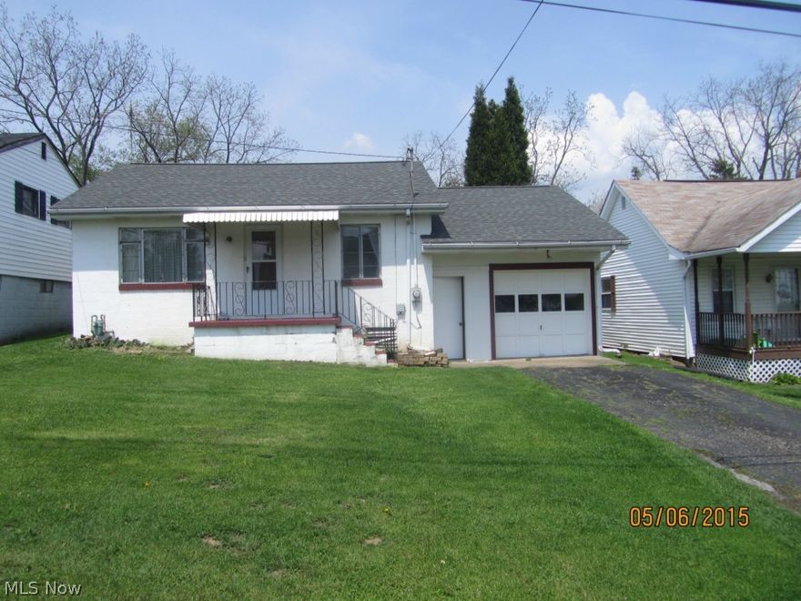 This well maintained home could be just right for you!  Fresh interior paint and newer carpet.  Paved driveway to  attached garage wit access straight into the kitchen for maximum convenience.  Additional rear lot with a large workshop.