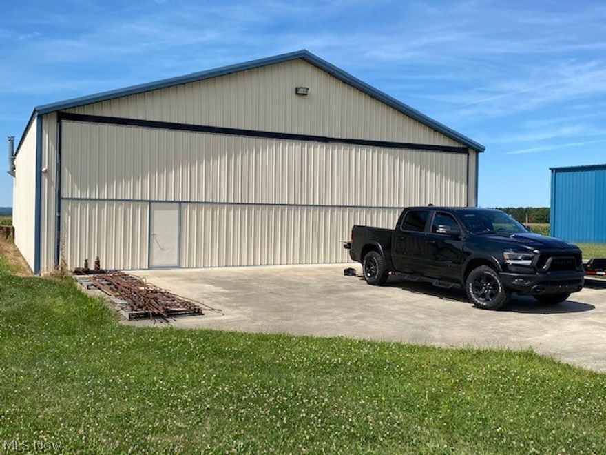 Outstanding  commercial airplane hangar, maintenance and office building.  Located on Ashland County Airport runway, adjacent to Ohio AME Medical Examiner. Rare opportunity to purchase fee simple ownership of 1/2 acre of land on County Airport ID 3G4
Utilities:  Electric, Well Water, Septic Sewage System 
Lot improvements consist of one contiguous Kentucky Steel Building, commercial pre-engineered metal truss building construction, constructed in 2002 with screw down metal ribbed insulated roofing with a 4/12 pitch gable roof design to meet snow load conditions. Building dimensions are 50’ X 60’ with 14’ eave height. Walls contain fiberglass batt insulation. Building interior features unheated concrete slab flooring, wood-burning heat A small finished interior room has a bathroom with a shower and kitchenette with electric heat. The combined NRA (Net Rentable Area) is 3,000 square feet. Frontage: 129.6 Front Feet 
Depth: 168.07 Feet  Size: 0.50 acres - 100.00% usable Lot Square Foot