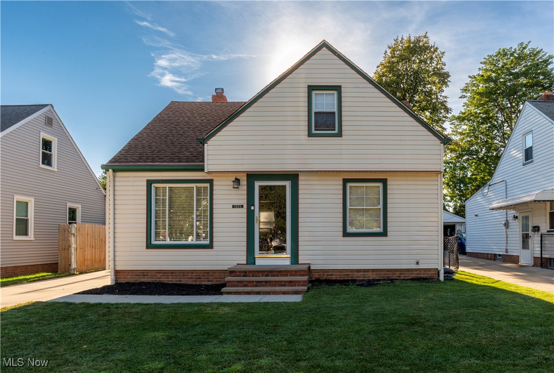 Welcome to 4574 Bentwood Dr – a beautifully maintained Cape Cod tucked away on a quiet street in the heart of Brooklyn. From the moment you arrive, you’ll notice the charming curb appeal, highlighted by tan vinyl siding with green and red trim complimenting the newer vinyl windows. To the left of the home, a freshly poured concrete driveway (2020) extends seamlessly to a cozy backyard patio and a spacious 2.5-car garage. The fully fenced yard, complete with a durable gate across the driveway (2020), offers privacy and functionality—perfect for gatherings, pets, or simply relaxing outdoors. Step inside to find tasteful updates and a warm, neutral color palette throughout. This inviting home features 3 generously sized bedrooms, 1 full bath, and a partially finished basement. Peace of mind comes with major updates, including newer A/C (2018), an updated electrical panel (2018), hot water tank (2025), and full exterior waterproofing (2020). Located just one block from Brooklyn High School and less than a mile from shopping, dining, multiple parks, and easy highway access via Tiedeman Rd and Ridge Rd, you really are in the heart of it all. This home combines charm, updates, and convenience in one fantastic package. Don’t miss your chance to schedule your private showing today!