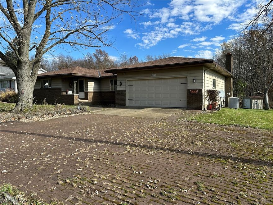 Have you been looking for a home with some privacy? What if I told you that you can get this 3 bedroom ranch, and that it is situated at the very end of a dead end street, which is next to acres and acres of land owned by a neighboring church? There is nothing but woods behind the house as well!  If you are someone that likes that peace and tranquility, then you will enjoy sitting on the large wrap around back deck, OR in the 23 x 15 enclosed patio!  This home is in the Lakeview School district. The home is in need of some modern touches, but it is also quite capable of being lived in now, and take your time with renovations. The roof is only a few months old, as it was totally replaced this past June! The basement is partially finished. No need to worry about walking thru the snow with this 2 car attached garage! There is so much to love about this home that you really need to come imagine what it will be!