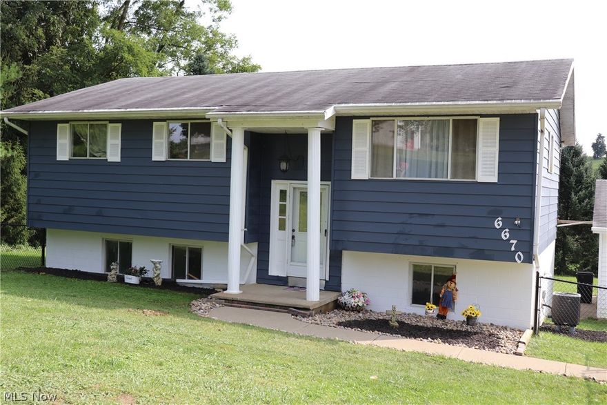 Call today for your private showing of this three bedroom, open kitchen, dining and living area home. Detached two car plus garage to store all of your vehicles and much more! Nice sized wooden deck off of the dining area that lets the sunshine pour in. Downstairs is a blank slate for an additional family room/storage, and laundry. Lower level has area for second bath. Basement has two exits, and two large windows for more natural light. Owner has replaced the HVAC system, water lines, and is leaving all appliances. Fenced in front yard.