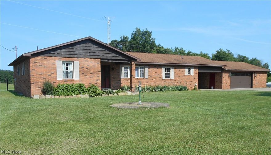 Classic brick ranch, offering all first floor living, on 5.27 acres with a pond!  3 bedrooms & 2 1/2 baths, plus large open concept living/dining room & kitchen. Beautifully updated throughout, with wood burning fireplace upstairs, and a whole house wood burning stove in the walk-out basement.  The lower level offers a spacious L-shaped rec room, a utility room, and 2 additional storage rooms. Outdoor features include an oversized 2 car garage, nice breezeway, large back deck, two storage buildings, several fruit trees, and a fully stocked pond.