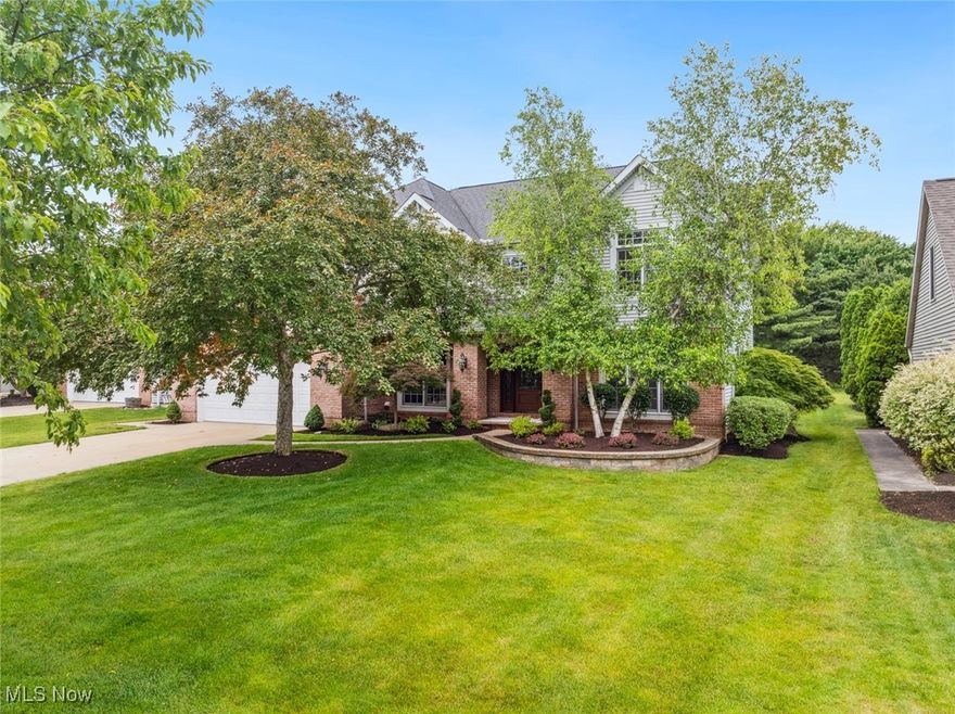 Welcome Home to this beautifully updated & meticulously maintained colonial, located on a cul-de-sac street in Strongsville’s Hampton Chase! This 4-Bedroom, 2.5 Bath home offers over 4,400 sq ft of finished living space, including a recently finished basement featuring a spacious rec room & home office! Step inside to the welcoming 2-story foyer w/a new staircase railing system w/newel posts & wrought iron spindles. The entire interior is freshly painted, including all trim & baseboards, and features new flooring throughout. The completely renovated kitchen is a chef’s dream with updated Kraft Maid Cabinetry/granite counters/ceramic backsplash/sink/faucet/all lighting, and high-end stainless-steel appliances, including a commercial-grade range hood! Other recent upgrades include a front door, all bathrooms/doors/lighting/hardware/light switches/switch plates, updated Laundry Room cabinets w/granite counters/sink/flooring/washer & dryer (2024). The Impressive 2-Story Great Room has built-in shelves, a cozy fireplace & windows all around that flood the space with natural light. The Living Room & Dining Room are adjacent to each other, perfect for entertaining & family gatherings. Inviting, arched doorways guide you through the main floor. A half bath completes the main level. Upstairs, the large primary suite is a true retreat, featuring a completely updated en-suite w/a stylish walk-in tile shower, soaking tub, dual vanities & walk-in closets. 3 additional bedrooms & a full bath complete this level. The finished LL offers a spacious rec room w/built-in cabinets, a home office, glass block windows & plenty of storage. The spacious backyard has a garden area, a large cement patio & plenty of room to grill, play & entertain. The professionally landscaped yard has a drip irrigation system in the mulch beds & sprinkler system in the lawn. ALL Appliances stay, including the washer/dryer! Do not miss your chance to own this incredible home! Schedule your showing today!