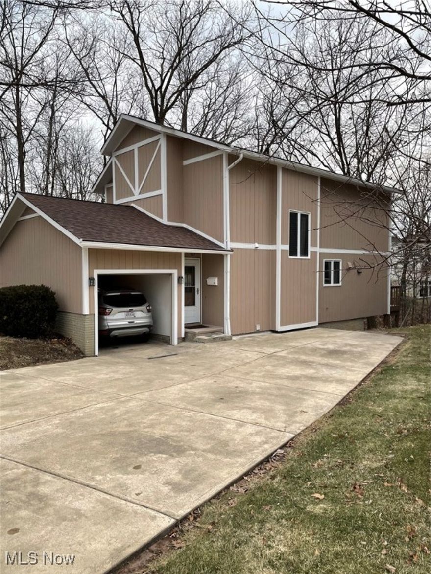 Late 20th-century 3 story contemporary with 3 bedrooms and 2.5 baths, with picturesque backyard views of Cahoon Creek.
Rare centrally located lot in Bay Village, directly across the street from Bay Middle School and within a short walking distance to parks, a public pool, a library, shopping, and the town center. Lake Erie can be seen from the property and is just a beautiful mile-long stroll away.
The lower level has a walkout to outside access as well as an office and a hookup-ready closet that can be converted to an additional bedroom and bathroom.