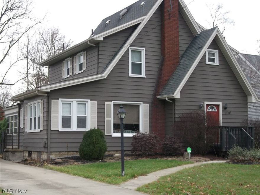 Character Galore! Spacious 3 bedroom 2 bath Beauty! Features large living room with beautiful fireplace and French doors to first sunroom presently used as office.  Second sunroom is off the kitchen overlooking fenced in back yard and deck. Also features formal dining room and efficient kitchen with all appliances.  Hardwood floors throughout the first floor, newer carpet on second floor, all newer vinyl replacement windows, and long drive to two car garage. Hurry on this one!