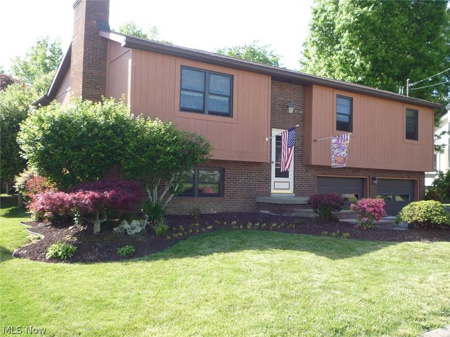 Very open design home with living room, kitchen and dining rooms.  Cathedral ceilings add to spacious, light and airy feel.  Everything meticulously maintained and updated.  Kitchen has  new granite look counters installed.  New Master bath & shower.  Fantastic screened back deck opens to an additional deck  and stairs to back yard.  Patio off lower level family room.  Lush green lawns on larger 90x96 lot.  Front entry professionally landscaped with pavers.  Just beautiful.  Wood burning fireplace.  12x29 back deck, both screened and open.  100% MOVE-IN READY!  Emerson Elementary, Hamilton Middle, Parkersburg High Schools.