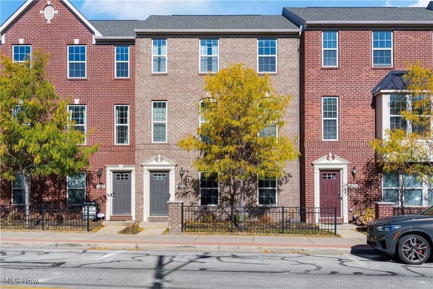 Built in 2017, this stylish and contemporary townhome offers the perfect blend of low-maintenance living and proximity to all of Cleveland’s favorite destinations. Step inside to a bright, open layout filled with natural light and beautiful vinyl plank flooring throughout the main level. The spacious living and dining areas flow seamlessly into the modern chef’s kitchen featuring rich espresso cabinetry, stainless steel appliances, a large center island, and a generous pantry. Enjoy your morning coffee or evening unwind on the private balcony deck just off the dining area. Upstairs, you’ll find all three bedrooms, including a serene primary suite with a dream walk-in closet, spa-like ensuite bath with soaking tub, granite countertops, and abundant natural light. The conveniently located laundry room and full bath complete the upper level for added functionality. The lower level offers endless potential for a home office, fitness area, or additional living space. Attached garage parking adds everyday convenience. Located minutes from Lakewood’s vibrant downtown, Edgewater Park, and a quick drive to downtown Cleveland, this home truly combines style, comfort, and an unbeatable location.